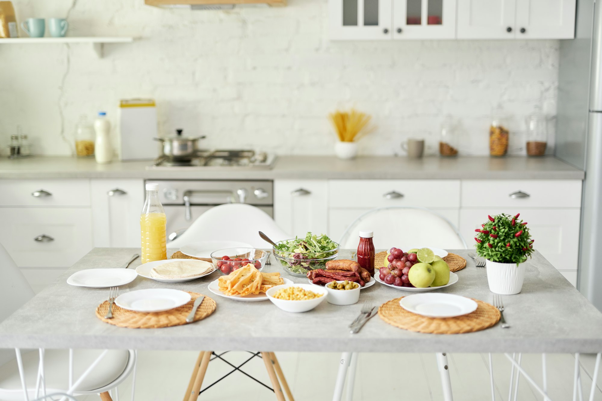 Modern bright white kitchen interior with wooden and white details